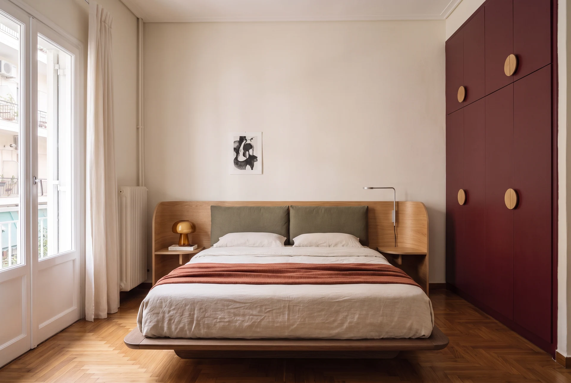 Bedroom — curved oak and soft textiles